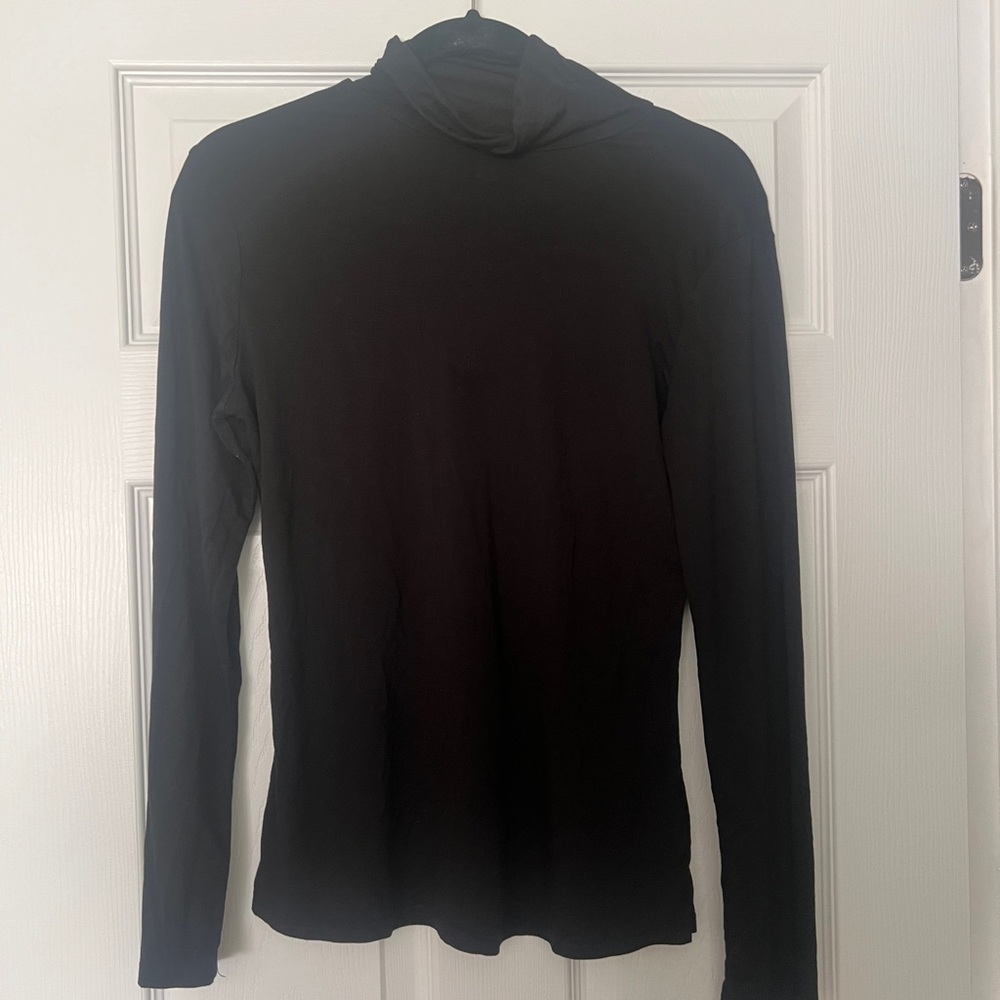 Women’s size L Herou black long sleeved turtleneck teeshirt.